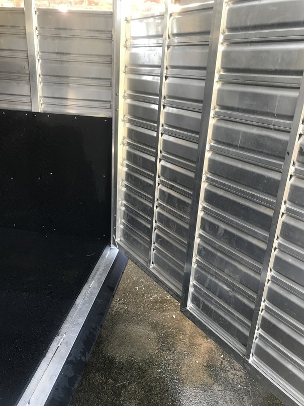 Inside rear gate of detailed horse trailer by ABC Mobile Detail, CA