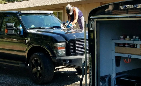 Polishing the hood on this Ford truck, done by DaNae Boyd, owner of ABC Mobile Detail, CA