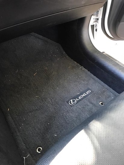 Before photo of dirty mat, dash of Lexus ES350